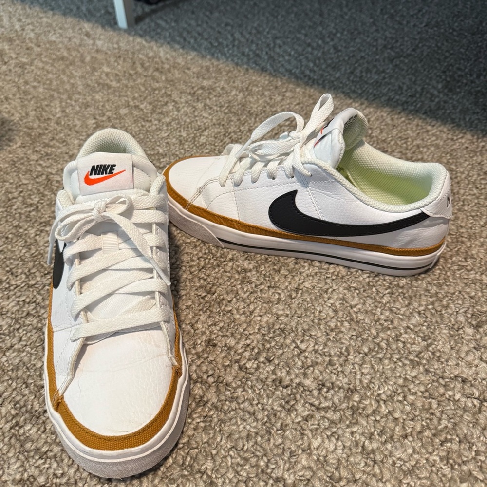 SOLD — Nike White and Gold Sneakers Classic Design